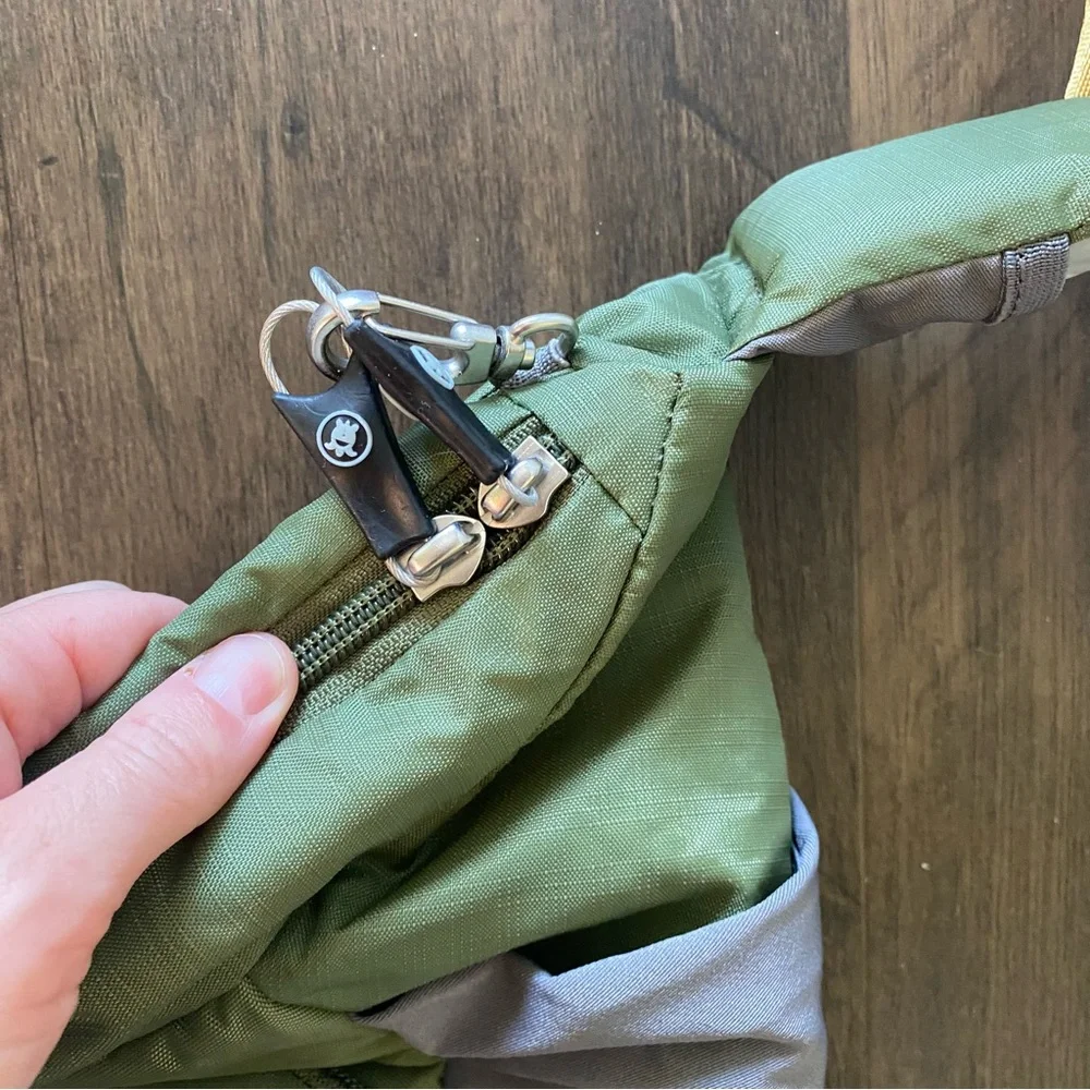 Pacsafe Olive Green and Mustard Yellow Crossbody Camera Bag